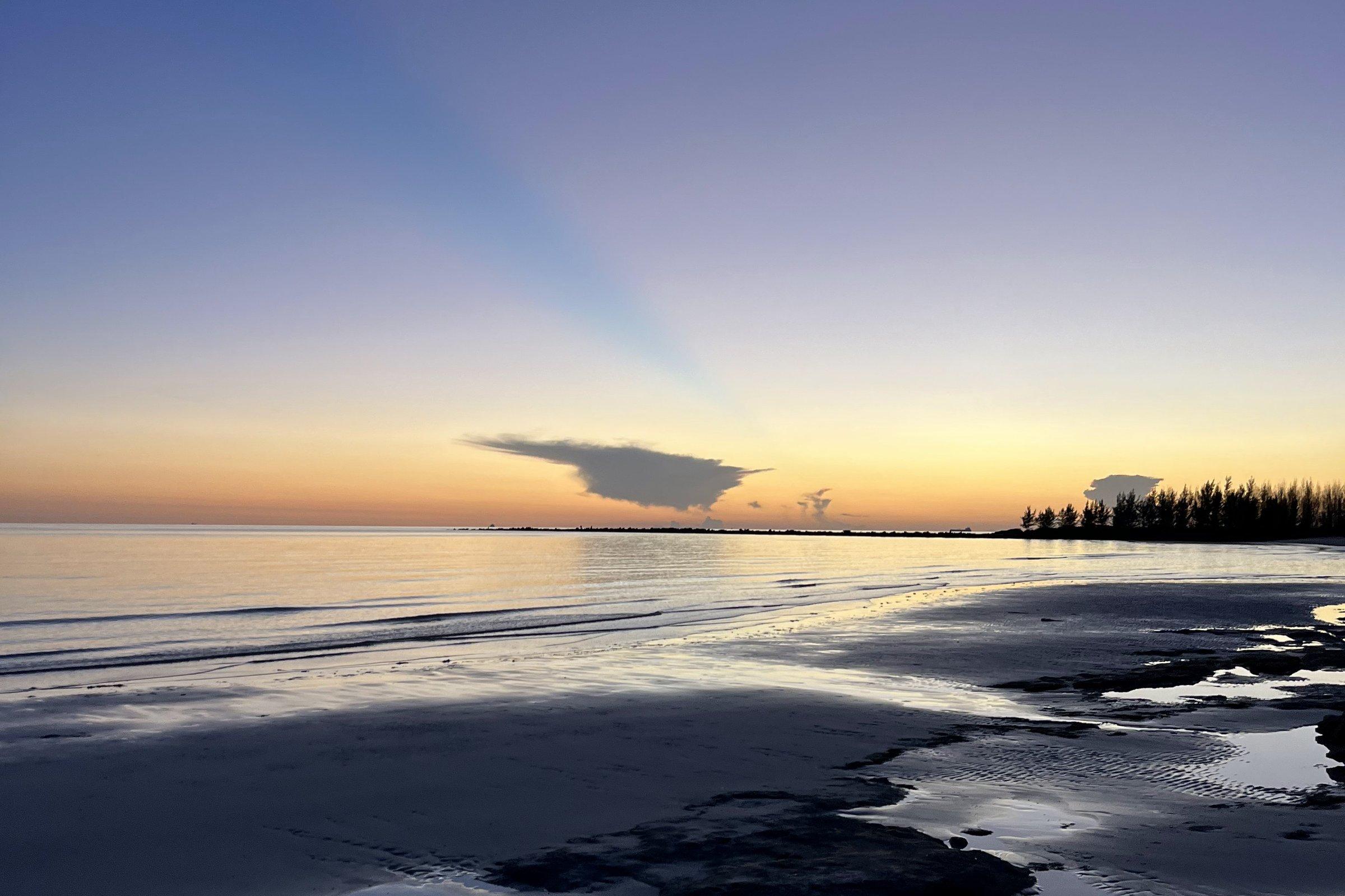 Low tide at dusk on an empty Bahamian beach