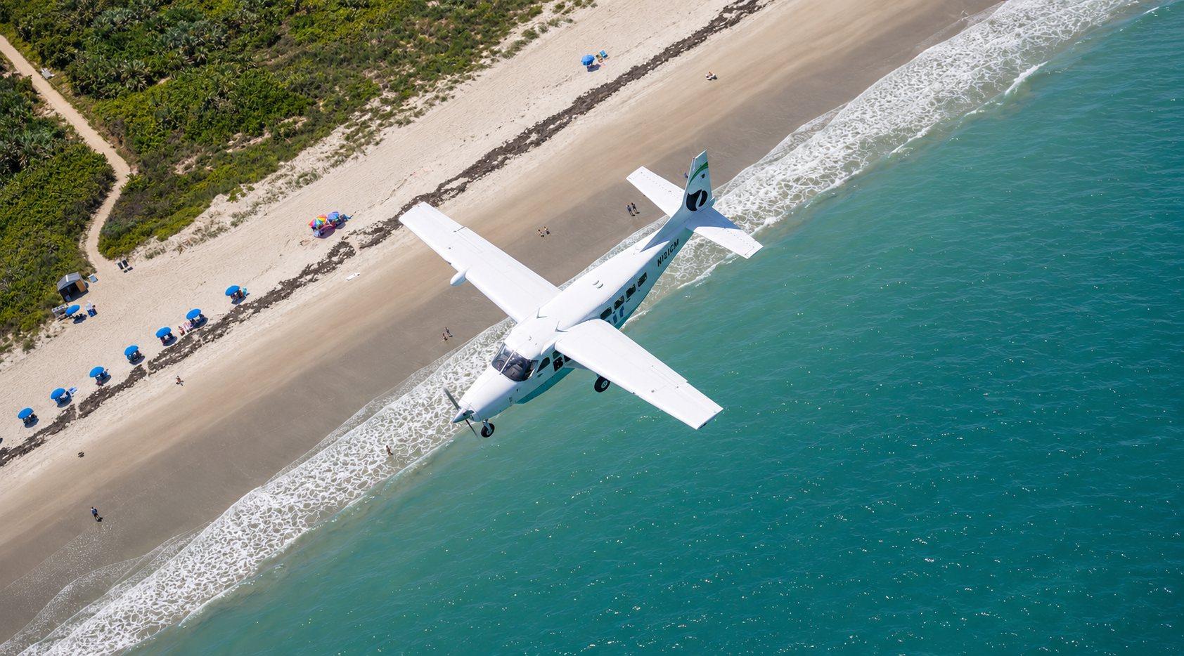 Buzz Air's Grand Caravan flying low along the Florida coast