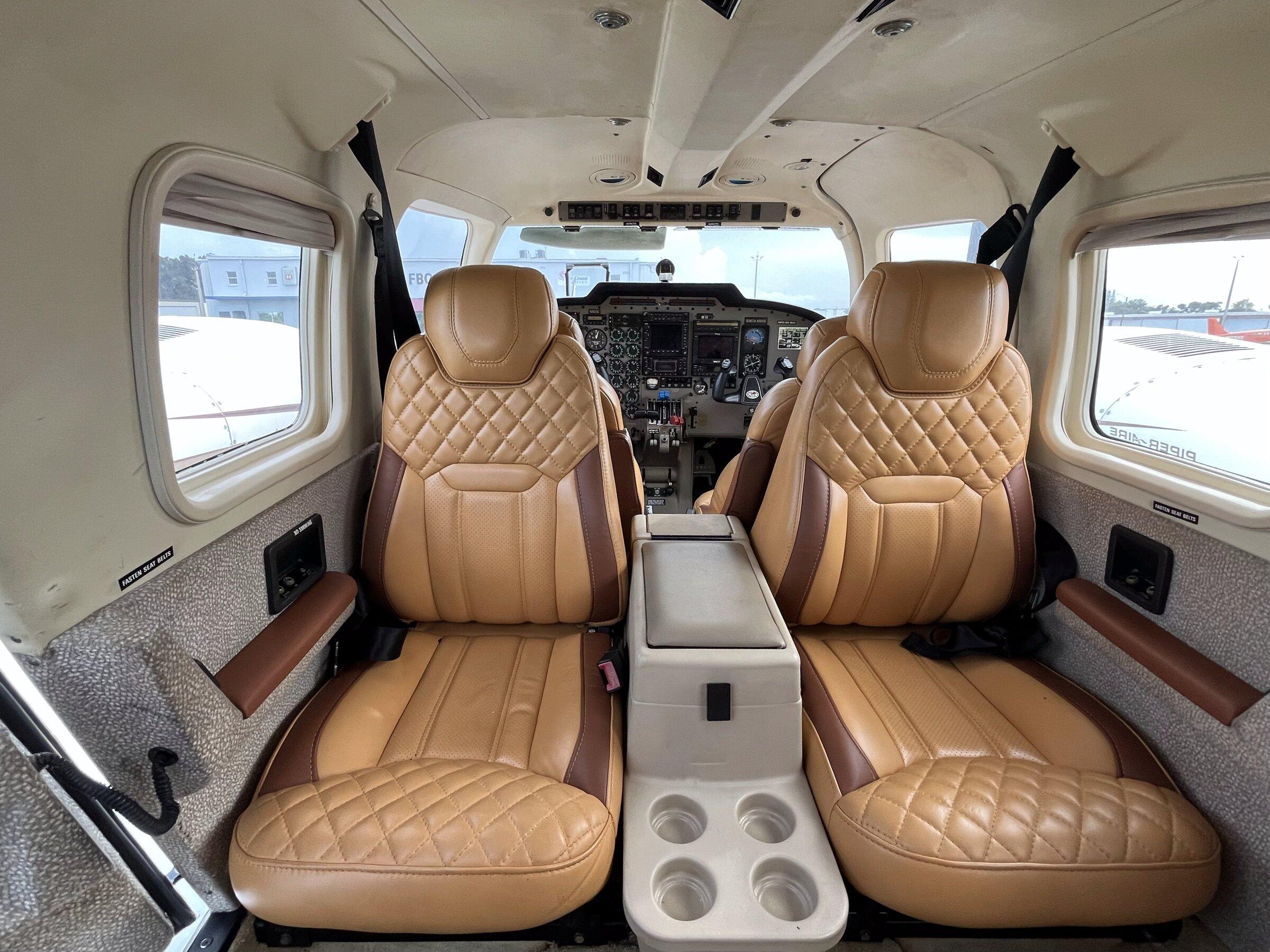 Club seating and center console in the Seneca cabin